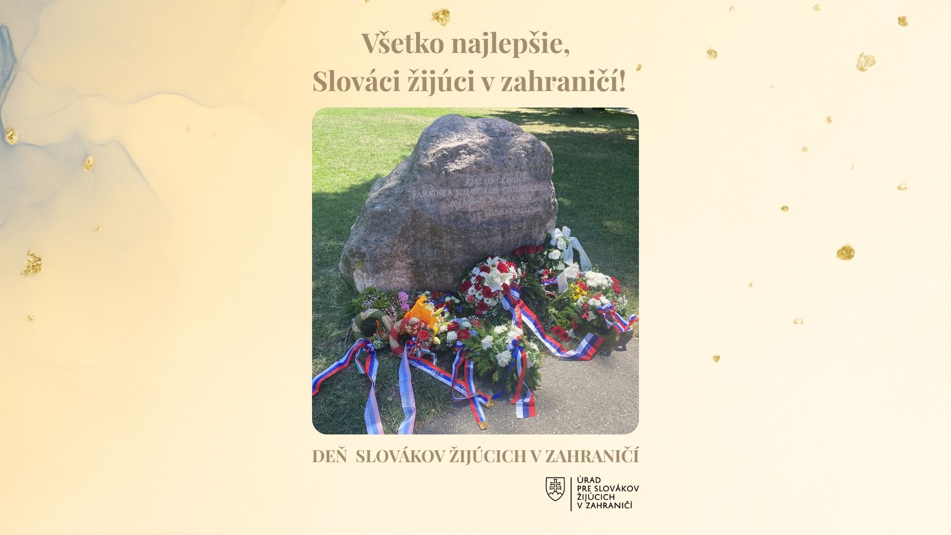zakladný kamen pamatníka, obložený vencami